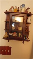Small knick knack cabinet with contents