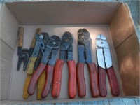 Tray of red handled wire cutters