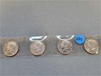 4 Kennedy half dollars; 1966, 1967, 1968, 1969.  B