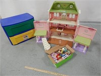 Fisher Price dollhouse with dolls and wood furnitu