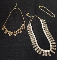 Two vintage necklaces with a rhinestone bracelet