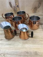 Copper cups and pitchers