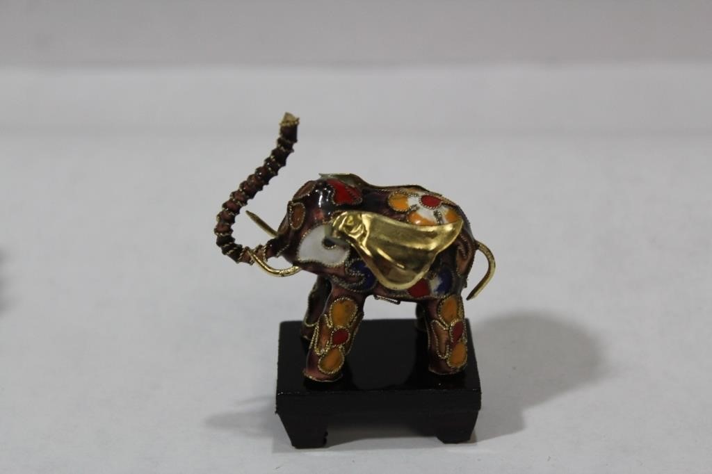 A Small Chinese Cloisonne Elephant on Stand