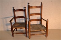 2 old child's rush seat ladder back arm chairs