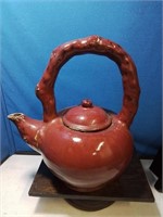 Large red glazed pottery teapot 15 inches tall