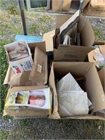 Pallet lot with miscellaneous items: books, maps,
