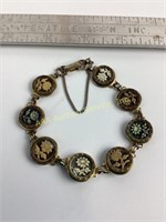 (8) Victorian flower picture buttons mounted as a