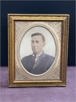 Antique framed portrait colored