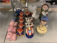 Assorted coin banks. Cows, bears and more.