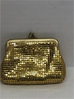 Gold colored coin purse