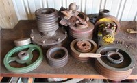 Collection of various size pulley wheels with