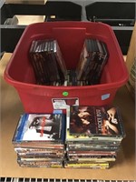 Bin assorted DVDs