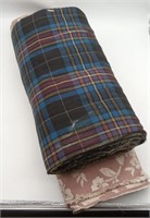 (FG) Fabric rolls assorted lengths and styles.