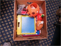 Toys including Mr. Potato Head, Snoopy doghouse,