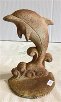 Cast iron dolphin doorstop measuring 7 inches