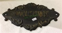 Cast iron “welcome“ wall plaque measuring 7“ x 10