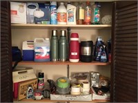 Contents of Closet: cleaners, thermos,