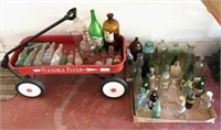 Red wagon, collectible bottles