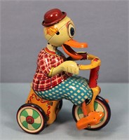 Vintage Quacking Duck on Tricycle Tin Windup Toy