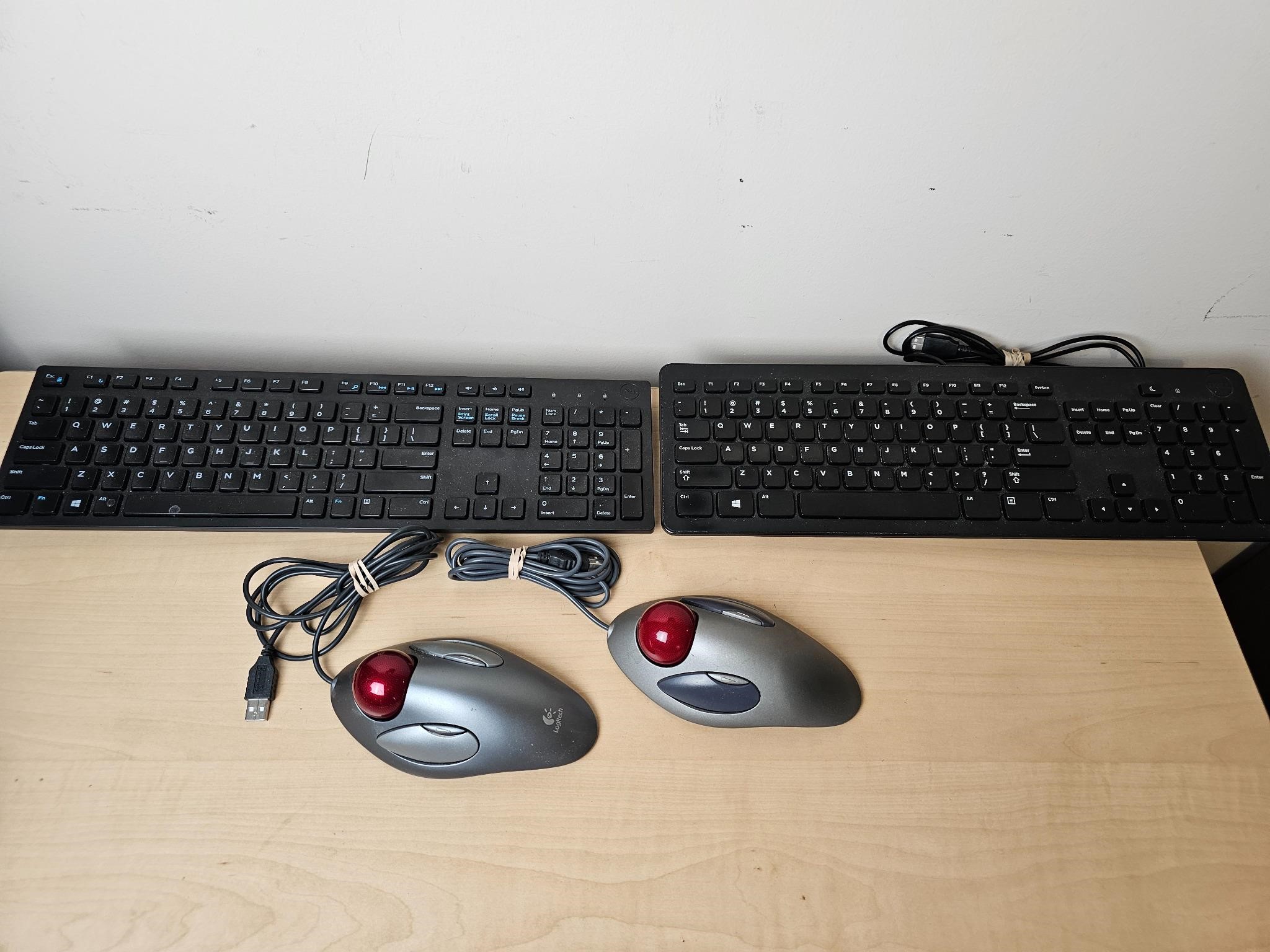 2 keyboards with  2 Logitech Mice