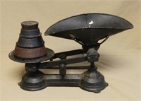 Balance Scales with Pans and Weights.