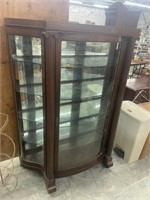 Antique bow front china cabinet