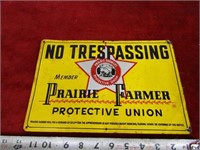Metal sign. No trespassing Prairie farmer.8" by 12