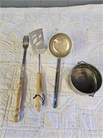 Various Camping utensils (ladle, spatula, pot)