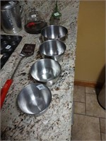 Cute small stainless steel mixing bowls.
