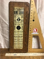 Advertising clipping on wood