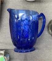Blue glass, pitcher, floral