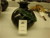 Black Indian pottery bowl with green iguana.