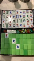 Box set of Chinese mah-jongg game tiles with an