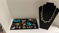 Large assortment of fashion jewelry (5 bracelets,