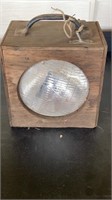 Vintage headlamp in wood box