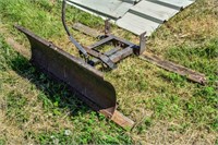 SMALL PLOW FOR LAWN TRACTOR (?)