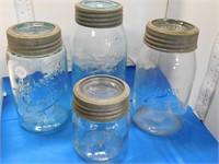 4 GLASS JARS WITH LIDS - 3 GEMS,  1 CROWN