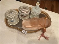 Mirror with atomizer and glass dishes
