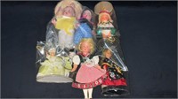 7 vintage dolls