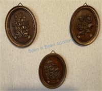 Three German floral plaques