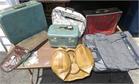 Table full of Vintage Luggage, Gun Case