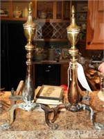 Pair of brass ball in claw foot andirons