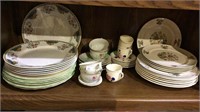 Shelf lot of different pattern china,  Plates,