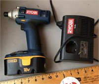 Ryobi battery powered drill with charger