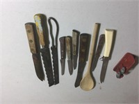 Old wooden handle knives, spoon, knife sharpener