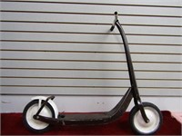 Antique pressed steel scooter.