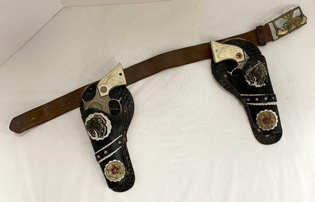Two Vintage Texan Jr. Cap Guns with Holsters