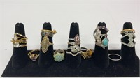 (22) rings, gold and silver toned with gemstones,