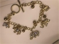 Unmarked charm bracelet- elephants