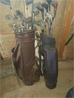 2 sets of golf clubs
